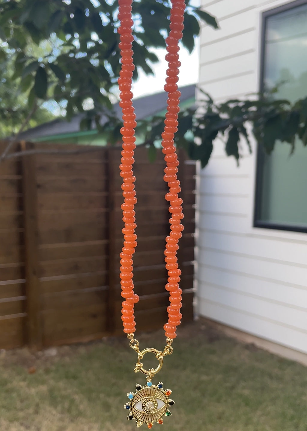 Burnt Orange Rondelle Necklace with Oversized Evil Eye Pendant