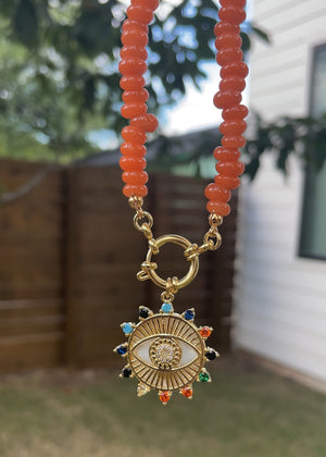 Burnt Orange Rondelle Necklace with Oversized Evil Eye Pendant